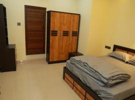 SJ Homes، فندق في Karukachal