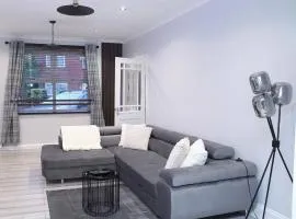 Stylish 3-Bed Retreat with Garden Conservatory