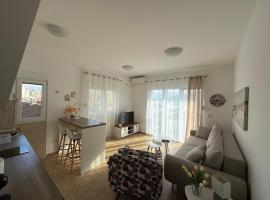 BlueCoast Apartment, hotel i Kravlja