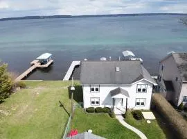 Cast away with kayaks a game room a fire pit and views