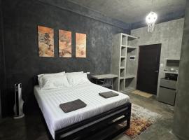 greyhouse moalboal queen bed, hótel í Moalboal