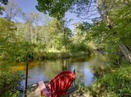 Little Manistee Riverfront Cabin with Fire Pit!, hotel in Irons
