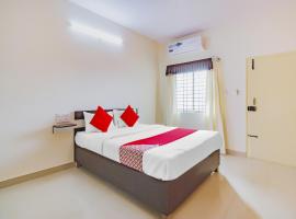 Hotel O P N K Suites, hotel in Jālahalli
