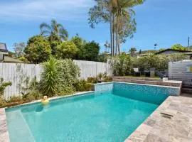 Sunlit Pool Your Holiday Centrepiece