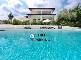 RESIDENCE FIORE ROSSO، مكان إقامة مع الخدمة الذاتية لإعداد الطعام في سيرمِيوني