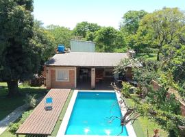 Rincón del sol casa con piscina, hotel a Santo Tomé