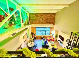 Festive Grinchmas Getaway Downtown At The Loft!