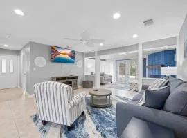 Updated Waterfront Pool Home with Putting Green