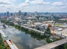 Walk to Broadway Riverfront Condo with Pool