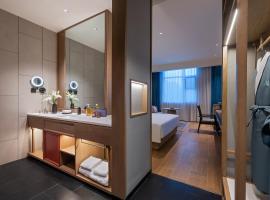 Lianyungang Wanda Plaza Manxin Mansion, ξενοδοχείο σε Danglu