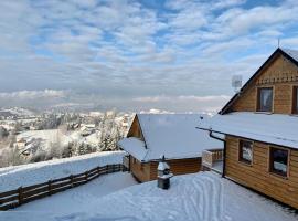 Osada Na Ochodzitej, brunarica v mestu Koniak&oacute;w