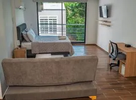 Modern studio apartment with AC and secure parking