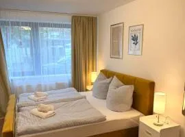Moderne, komplett eingerichtete Wohnung mit Parkplatz & 24h Check-in