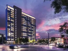 Departamento Nuevo 1D1B con estacionamiento sobre stripcenter y supermercado