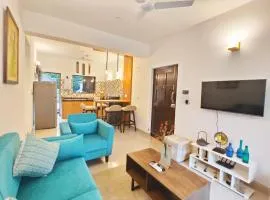Premium 2BHK Assagao Apartment with Pool, WiFi & Scenic Balcony View