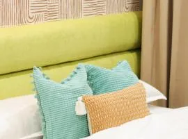 House of Keul - 2BR cozy condo in Dumaguete with pool and free laundry for long term guests up to 4 pax