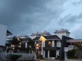 Sohum villa، فندق في سورات