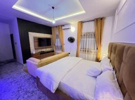 Mags Residence, hotel ve Warri