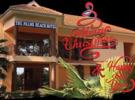 The Palms Beach Hotel Tour Travel，位于恩德培的海滩酒店
