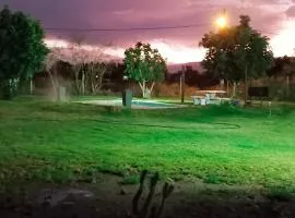 Plumas verde, casa campo