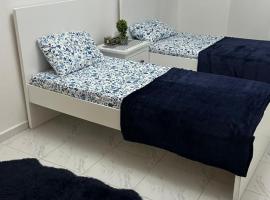 Bed space in Luxury hostel - سرير مفردفي شقة فندقية, hotel in Sharjah