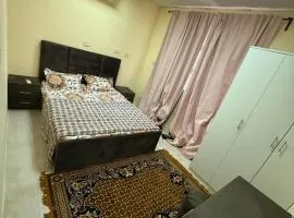 Economicals & Small apartment 10 minutes from Abu Dhabi Airport for Married Couple or Single