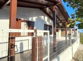 Casa branca, pé na areia