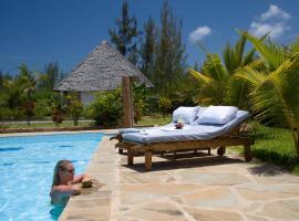 Sheba Cottages - Diani Beach, отель в Диани-Бич, рядом находится Kaya Kinondo Sacred Forest