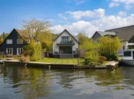 Rendezvous - stunning corner plot on the main river in Wroxham