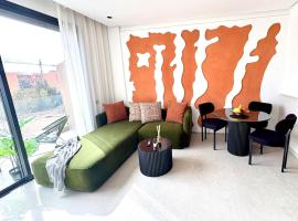 Lovely condo Marrakech city center terrasse garage，馬拉喀什的分租公寓