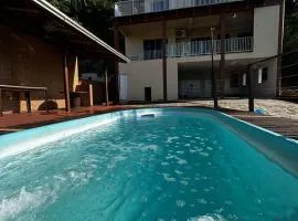 Casa exclusiva com piscina aquecida
