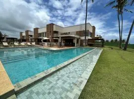 Belíssimo Village pé na areia em Itacimirim