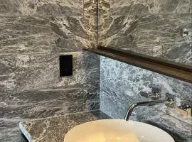 Boutique New 1-Bedroom Condo in Heart of Downtown