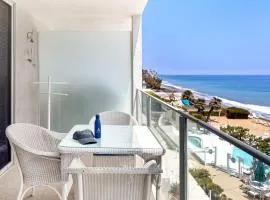 Oceanfront Gem w Balcony Pool Hot Tub Carbon Beach Access Bluewater Haven by AvantStay
