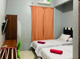 Home Stay Kembar Syariah RedPartner、Binjaiのホテル
