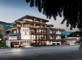Hubertus Logis Apartments, hotel in Brixen im Thale