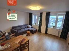 Słoneczny Apartament Panorama 5 7 z Widokiem na Jezioro i Góry