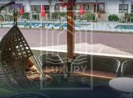 Ground Floor Chalet , 4 Bedrooms , Families Only-Near the Sea للعائلات فقط