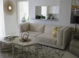 Modern Three-Bedroom Beachside Retreat With Private Balcony