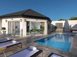 וילה מילגרוס - וילה עם בריכה פרטית מחוממת ומקורה - נוף לים