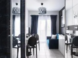 Nowoczesny apartament GLAMOUR Łódź z prysznicem pośrodku