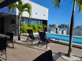 Lindo Studio com Piscina a poucos passos da Praia