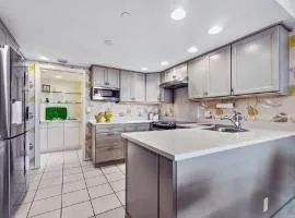 Bright Two-Bedroom Waterfront Retreat With Scenic Balcony Views