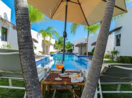 Oasis Tajaja Pousada, hotel in Jacumã