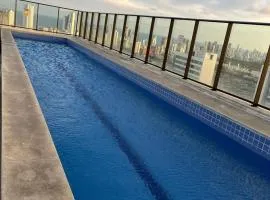 Flat Beach Class Excelsior - Apto Completo para 4 pessoas vista rio e mar