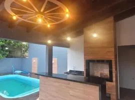 Casa com Quiosque e piscina!