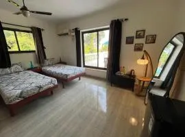 Indigo Orchid Homestay - A spacious, serene villa with terrace and farm view