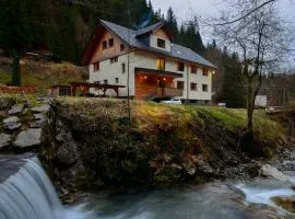 Apartmaji nad potokom