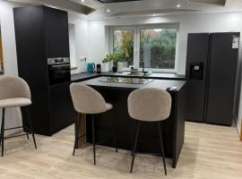 Villa aux portes de Bruxelles โรงแรมในดิลเบค