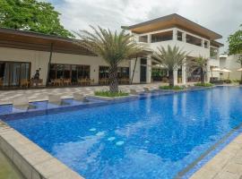 The Tropics at MacArthur Park, отель в городе Palo